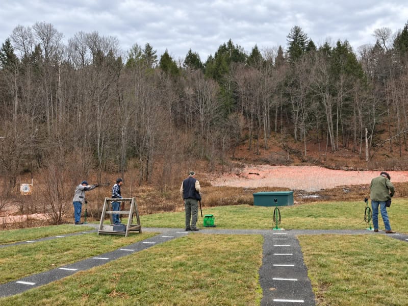 Club members taking part in trap shooting at the Chester outdoor range